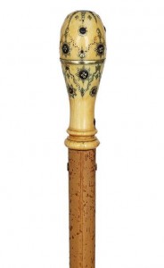 Cane with tortoiseshell and brass wire piqué on ivory.