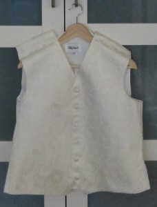 Ivory paisley waistcoat, pinned for the cuts to the shoulders