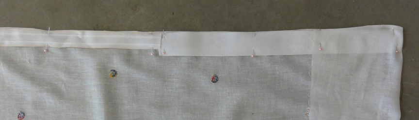 gathering tape and waistband material inside paisley embroidered fabric for use as a skirt