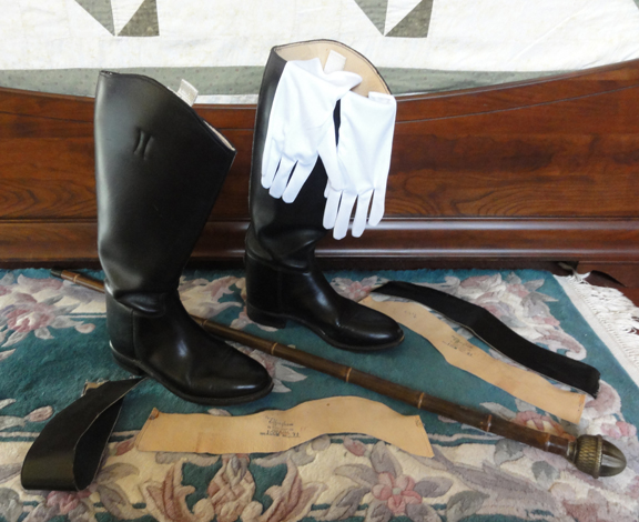 TSRCE men's boots, gloves, and walking stick. The cut-off panels from the boots are shown.